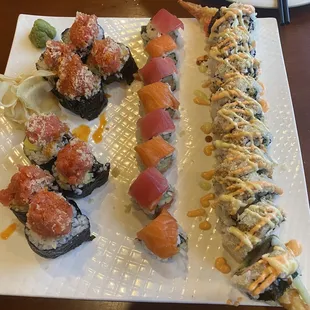 Volcano roll, twin spicy roll, and dragon roll