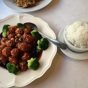 Sesame chicken comes with steamed rice.