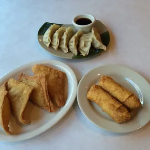 Crab rangoon, egg rolls and steamed pot stickers.