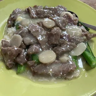 smooth egg with beef over rice