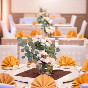a table set for a wedding reception