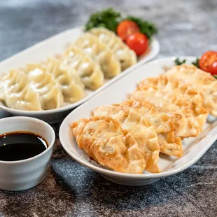 two plates of food and a cup of coffee