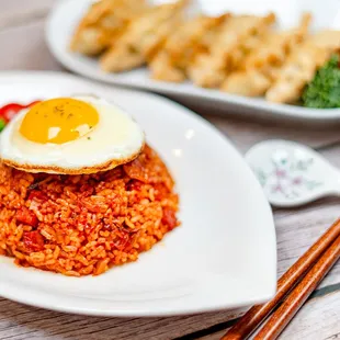 a fried egg on top of rice