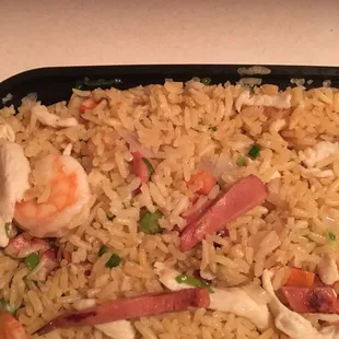 Hot dog in the house special fried rice.  Wow