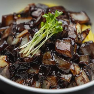 Jja-Jang-Myeon Noodles: Korean-Chinese stir fried black bean paste with beef, fried potatoes, and copped onions.