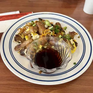 Pan fried rice cakes, one of their most popular items.