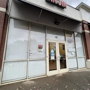 the front entrance of a restaurant