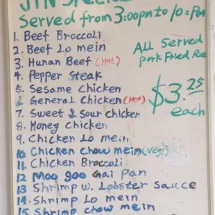 a menu on a white board
