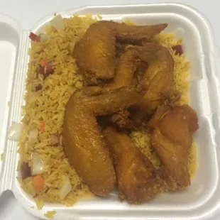 chicken and rice in a styrofoam container