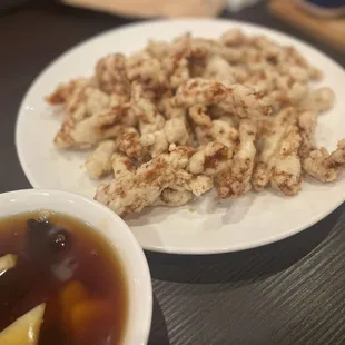 a plate of food and a bowl of soup