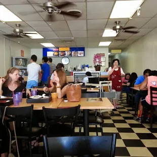 This photo makes it look spacious and clean. I was seated with strangers!