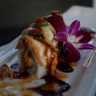  a closeup of a sushi with a flower