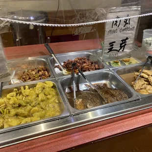 a variety of food items in a display case