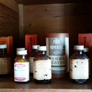 a shelf full of bottles