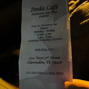 a person holding a piece of paper