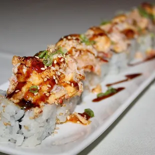 The Snow Crab Dynamite Roll was made with snow crab, spiced masago aioli, &amp; osaki mix.