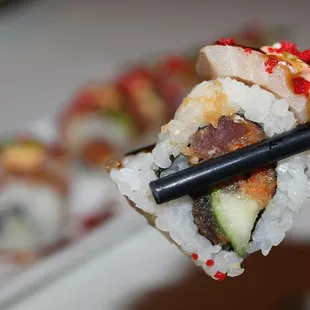 The Hamachi Crunch Roll was made with spicy tuna &amp; crispy tempura flakes.
