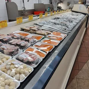 Seafood filets and whole fish. Seem decently fresh. According to their signs much if it is previously frozen though.