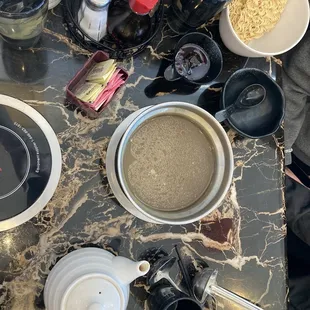 Hot pot broth mushroom and ramen noodles