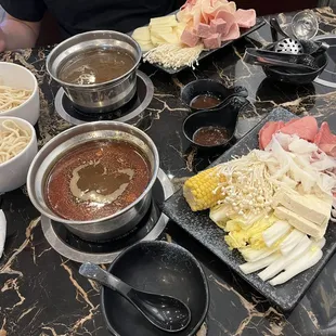 Chinese hot pot. Spicy and Mushroom soup base with chef's special sauce.