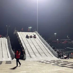 "Snow tubing" with flood lights.