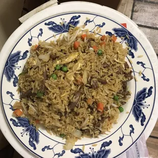 a plate of rice and vegetables