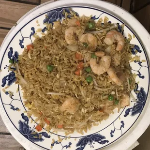 a plate of shrimp fried rice