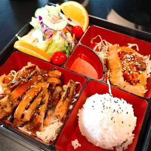 a bento box of food