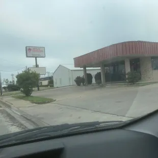 a view of the outside of a restaurant