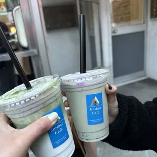 Black sesame matcha latte on left and ube matcha latte with boba on the right (not real boba - crystal boba - but labeled as boba)