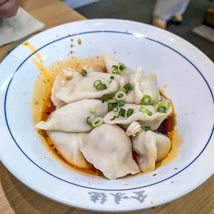 spicy dumplings $15