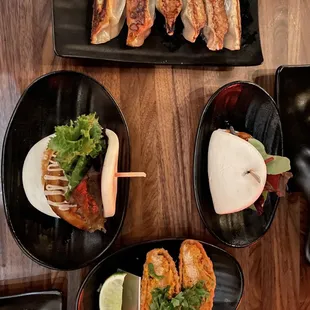 Pork Gyoza ( 6pcs), JINYA Bun (1pc), Spicy Tuna Tacos* (2 pcs)