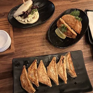 Pork Gyoza ( 6pcs)JINYA Bun (1pc)Salmon Poke Tacos* (2 pcs)
