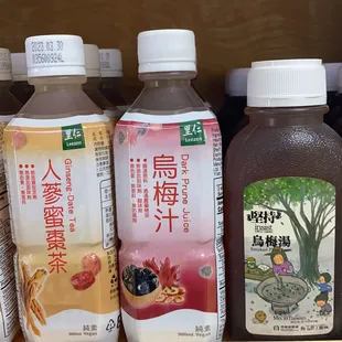 a variety of juices on a shelf