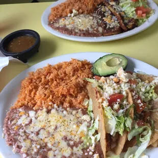 two plates of mexican food