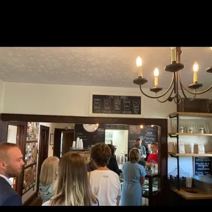 a group of people standing in line