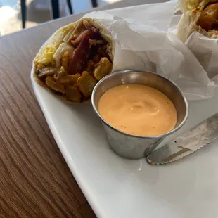 Bacon breakfast burrito with Siracha Mayo