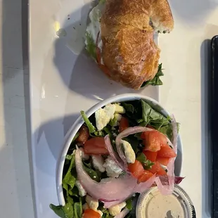 Chicken Salad sandwich (minus one bite ) and house salad with ranch.