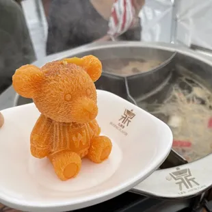 Teddy bear comes only spicy and old hot pot.