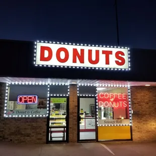 a donut shop at night