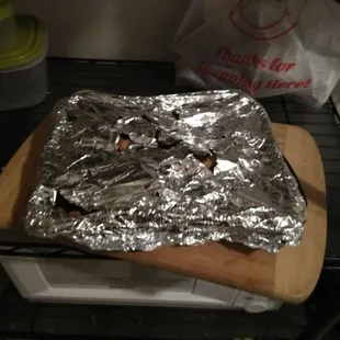 Holes all in the Not bucket of &quot;Chicken Wings Bucket&quot; foil.  Do not order the not Bucket of Chicken.