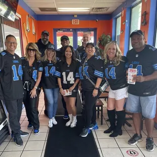 Our very large group headed to the Lions game!! Big smiles and full tummies!!