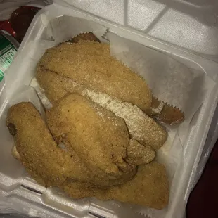 fried chicken in a styrofoam container