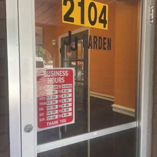 a sign in the window of a business