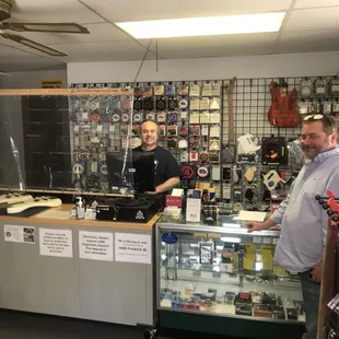 John and a satisfied customer picking up his custom basses. And they are NICE