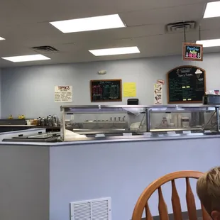 a boy sitting at a table