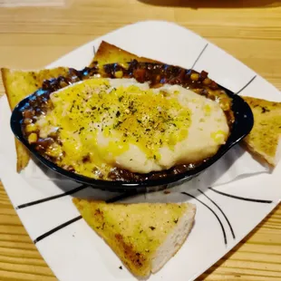 Shepherd pie. It has cheese. Not disclosed on the menu.