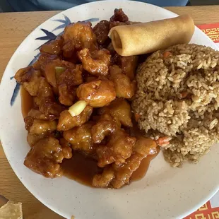 General Tso&apos;s Chicken with fried rice and a spring roll