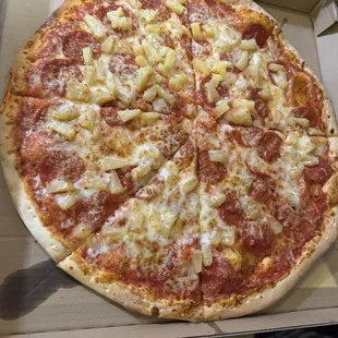Pineapple and Pepperoni. One slice had no pepperoni on it.