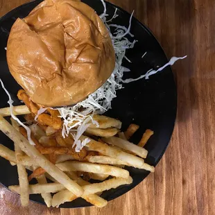 GRILLED CHICKEN SANDWICH chili lime marinade, mango salsa, bacon, lettuce, tomato, red pepper aioli with mixed fries